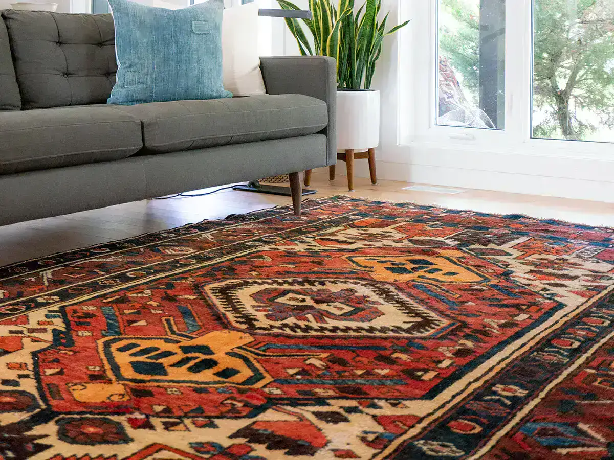 Hand-Knotted Persian Rug with Vibrant Colors and Geometric Designs, Adding Warmth to a Modern Living Room