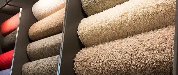 Wide Selection of Carpet Samples, Including Plush, Berber, and Loop Styles, Available for Purchase