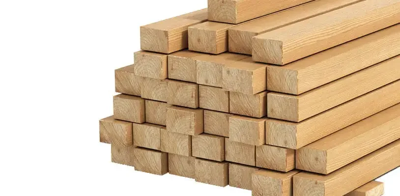 Stack of timber wooden planks neatly arranged for construction and woodworking projects.