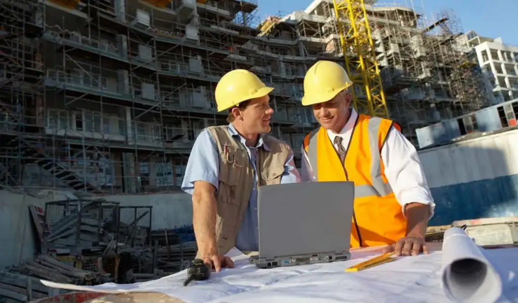 Contractors analyzing project details for construction leads