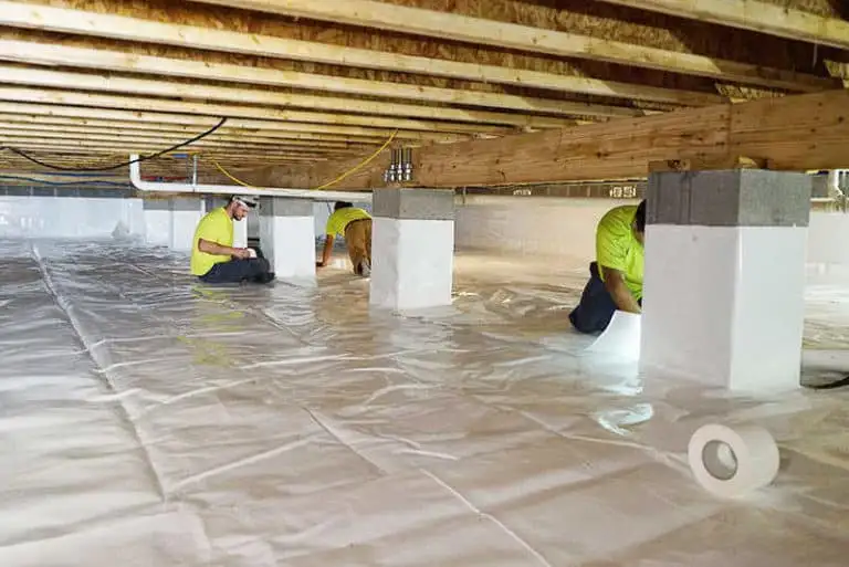 Labor Installing Insulation in a Crawl Space