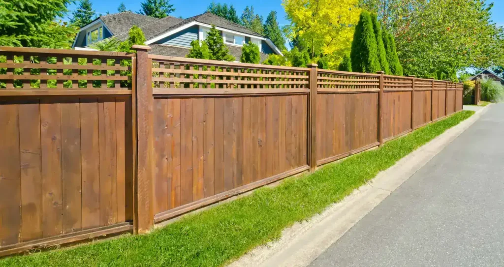 Wooden privacy fence along a suburban street